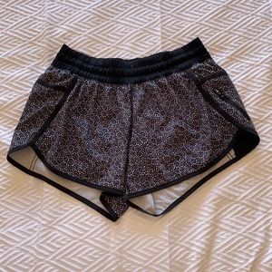 Lululemon black floral print athletic shorts - Size 6